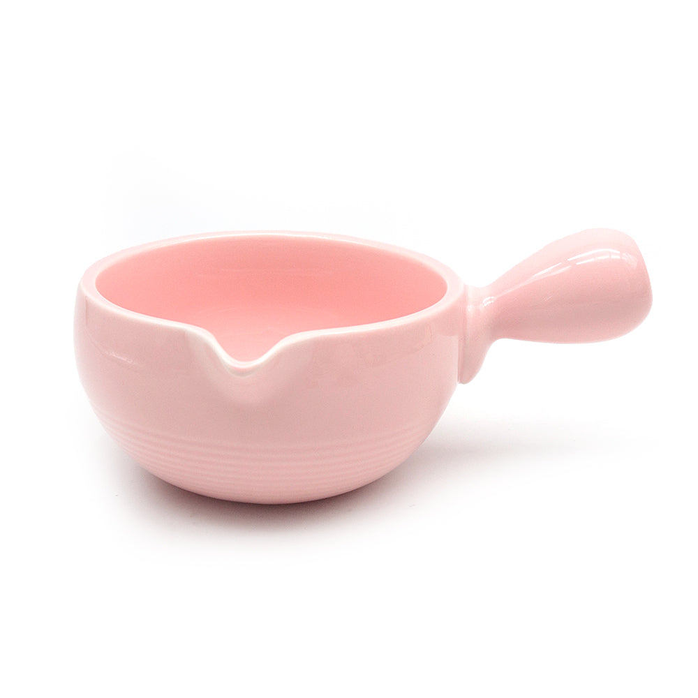 pink ceramic matcha bowl in white background