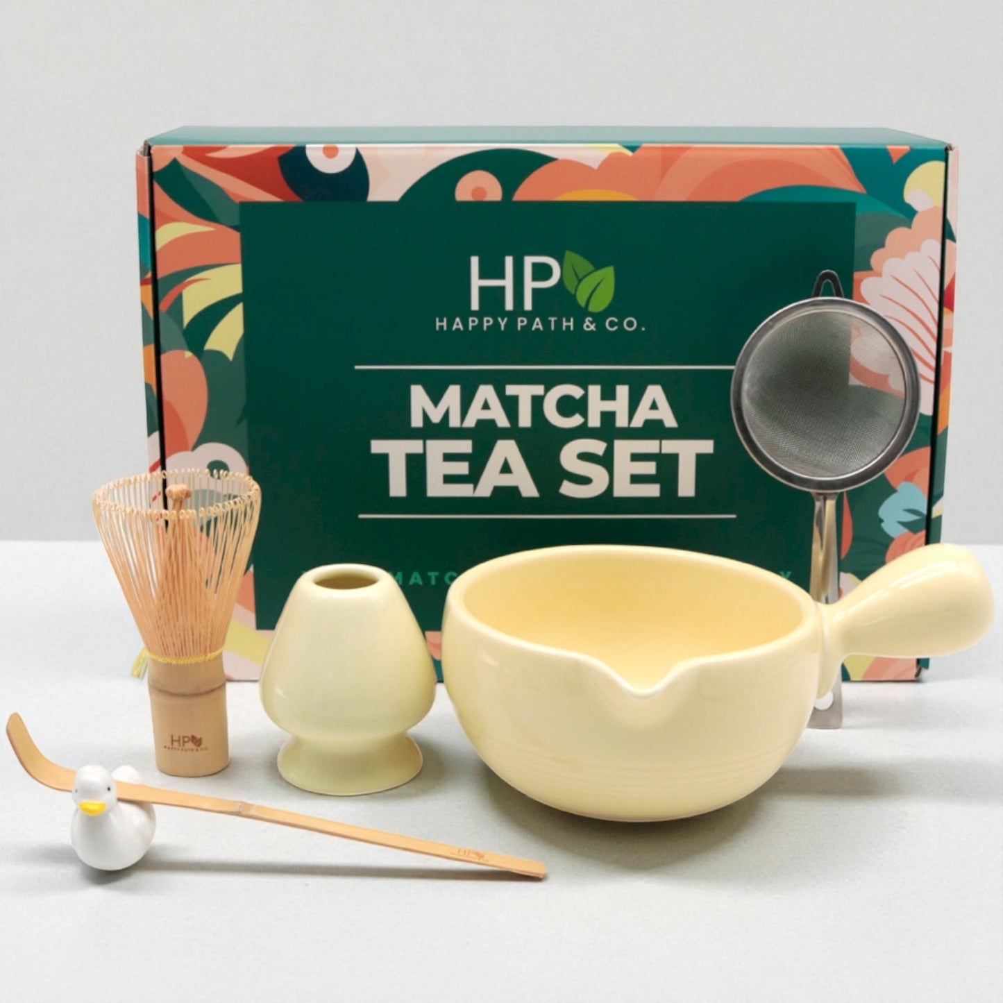 Matcha tea set with tools and Happy Path & Co. packaging on a white background